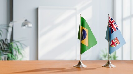 FLAGS OF BRAZIL AND FIJI ON TABLE