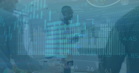 Image of financial data processing over diverse business people in office