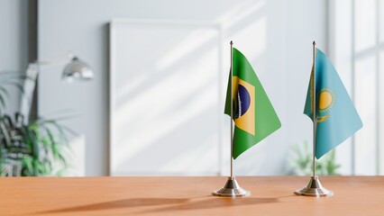 FLAGS OF BRAZIL AND KAZAKHASTAN ON TABLE