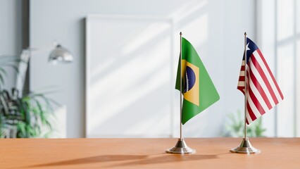 FLAGS OF BRAZIL AND LIBERIA ON TABLE