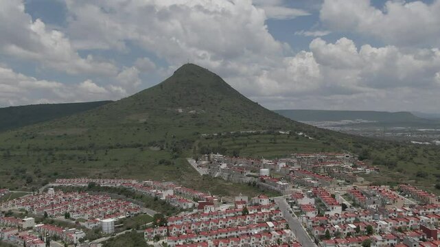 Hills with a white cross on top