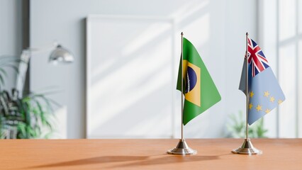 FLAGS OF BRAZIL AND TUVALU ON TABLE