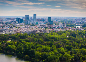 Northern part of Bucharest from above. Aerial cityscape photo with Bucharest, Romania, next to Arch of Triumph, Herastrau Lake and Free Press Square (Piata Presei Libere in Romanian). Visit Romania.