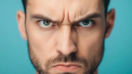 Obraz premium Closeup of a Person s Face Displaying an Intense Facial Expression of Unspoken Anger and Silent Fury with a Furrowed Brow and Tightly Pursed Lips Conveying Strong Negative Emotion and Inner Conflict