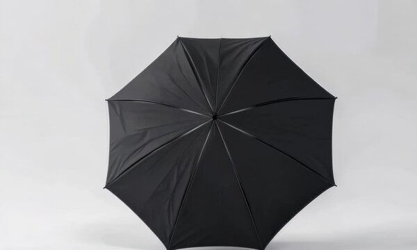Classic black umbrella on white background, Video