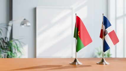 FLAGS OF BURKINA-FASO AND DOMINICAN REPUBLIC ON TABLE