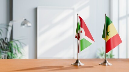 FLAGS OF BURUNDI AND SENEGAL ON TABLE