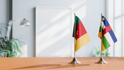 FLAGS OF CAMEROON AND CENTRAL AFRICAN REPUBLIC ON TABLE