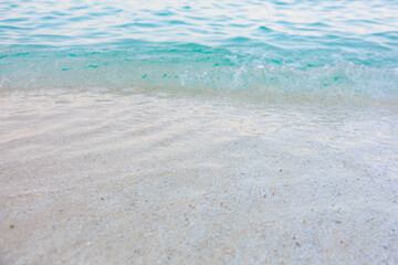 The ocean is calm and the water is blue