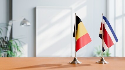 FLAGS OF CHAD AND COSTA RICA ON TABLE