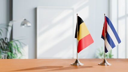 FLAGS OF CHAD AND CUBA ON TABLE