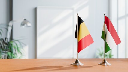 FLAGS OF CHAD AND HUNGARY ON TABLE