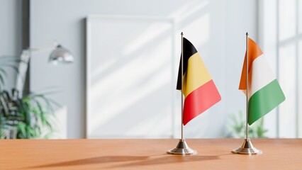 FLAGS OF CHAD AND IVORY COAST ON TABLE