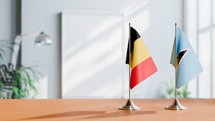 FLAGS OF CHAD AND SAINT LUCIA ON TABLE