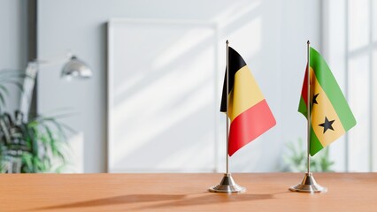 FLAGS OF CHAD AND SAO TOME ON TABLE