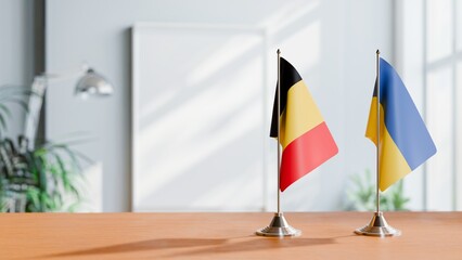 FLAGS OF CHAD AND UKRAINE ON TABLE