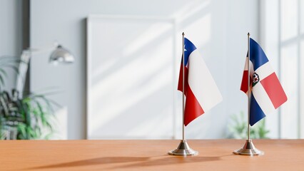 FLAGS OF CHILE AND DOMINICAN REPUBLIC ON TABLE