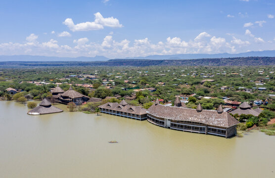 Aerial view of submerged buildings in rising waters of Lake Baringo, Kampi ya Samaki, Kenya.