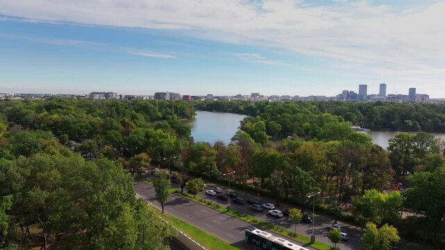 Northern part of Bucharest from above. Aerial cityscape 4k video with Bucharest, Romania, next to Arch of Triumph, Herastrau Lake and Free Press Square (Piata Presei Libere in Romanian). Visit Romania