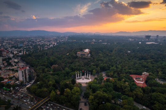 Aerial view of Castillo de Chapultepec and Monumento a los Ninos Heroes in Bosque de Chapultepec park at sunset, Miguel Hidalgo, Mexico.
