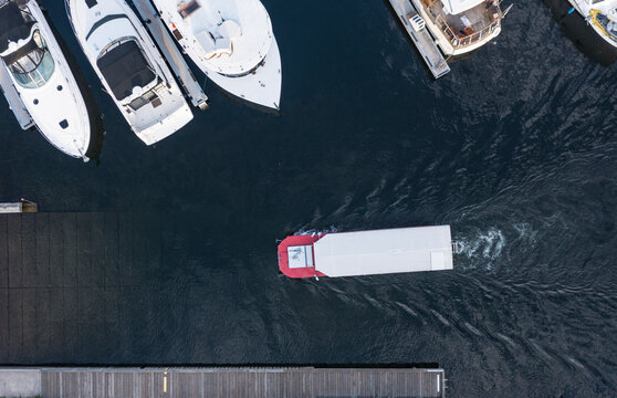 Aerial view of Lake Union with amphibious vehicle and boats, Seattle, United States.