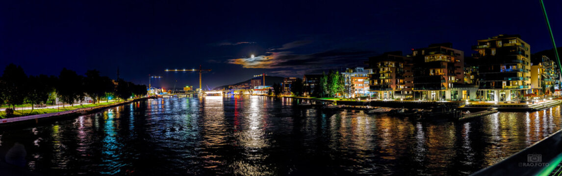 Drammen river at night, looking east from the Ypsilon bridge