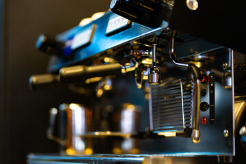 close-up image of the coffee machines that are operating automatical Coffee flowing into coffee cup that is prepar for service Coffee aroma bake the whole shop and the shop atmosphere that look warm