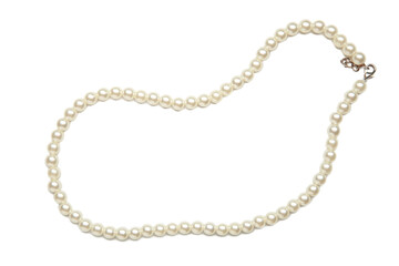 Elegant pearl necklace isolated on white background, top view. Space for text