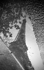 Reflections in a puddle, street photography in Paris