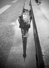 Reflections in a puddle, street photography in Paris