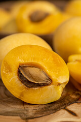 ripe soft apricot fruits on the cutting board