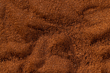 a large amount of ground coffee powder close-up