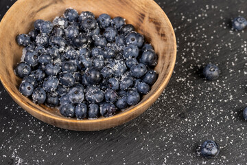 sprinkled with white sweet sugar juicy blueberry berries