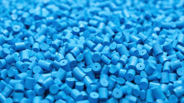 Fly around pile of blue plastic polypropylene granules, masterbatch polymer grain. HDPE or PVC resin pellets. 3d render animation