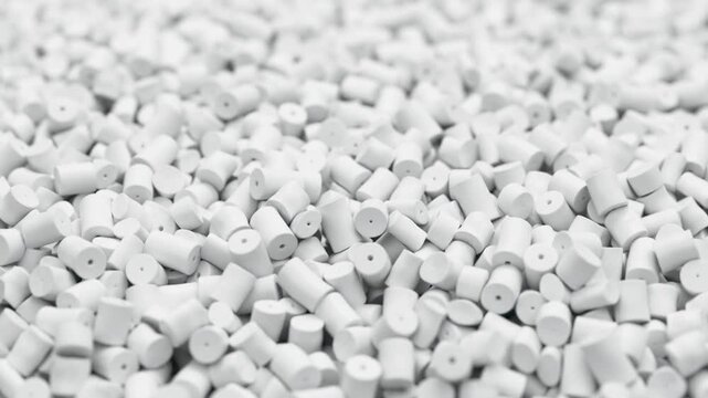 Fly around pile of white plastic polypropylene granules, masterbatch polymer grain. HDPE or PVC resin pellets. 3d render animation