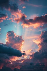 Fototapeta premium Vivid Sunset Sky, Dramatic Cloudscape with Colorful Orange, Pink, and Blue Hues at Twilight