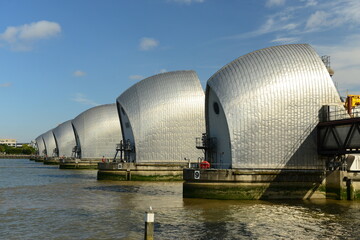 The London Thames flood barrier, England, U.K. On a calm sunny September day with the barriers down.