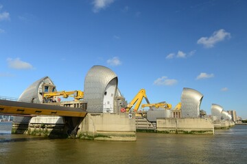 The London Thames flood barrier, England, U.K. On a calm sunny September day with the barriers down.