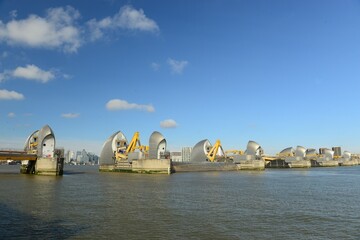 The London Thames flood barrier, England, U.K. On a calm sunny September day with the barriers down.