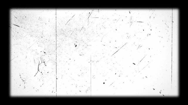 Old film grain scratches for video. Overlay vfx to make the movie look old and damaged. Grunge footage with lines and dust, dirty and hairs to be used in multiply or overlay layer effect, 8mm style.