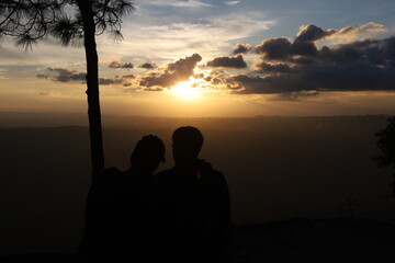 silhouette of a couple at sunrise