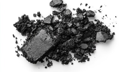 Black eyeshadow scattered on white background. Ideal for beauty, fashion, and cosmetic advertising.