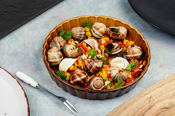 Exotic snail filled with garlic and herbs
