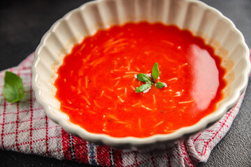Tomato soup with vermicelli gazpacho first course dish fresh delicious gourmet food background on the table rustic food top view copy space keto and paleo diet Vegetarian and vegan food