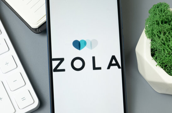 New York, USA - 30 August 2024: Zola Logo on Phone Screen, Company Icon on Display