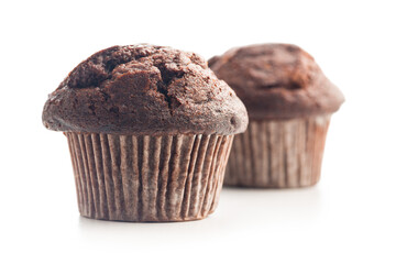 Sweet muffin cakes isolated on white background.