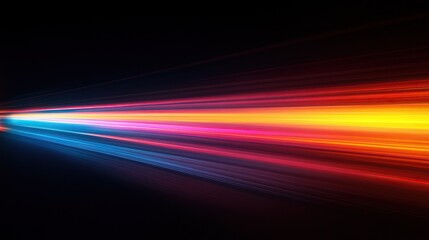 Vibrant light streaks in blue, pink, and orange create a dynamic and energetic visual effect against a dark background.