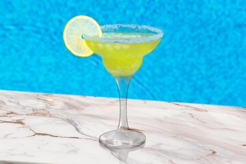 Glass of tasty alcohol drink at resort hotel