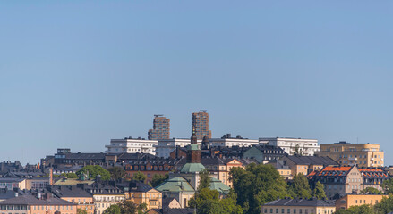 Apartment houses and skyscrapers on the island Kungsholmen and the district Vasastan, a sunny summer day in Stockholm