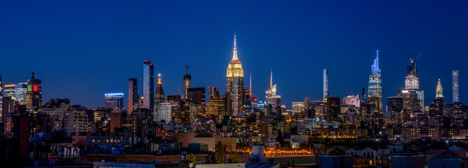 Obraz premium Photos of New York City's skyline and dense buildings